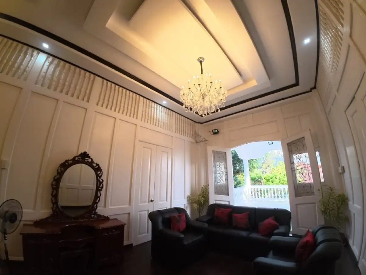 Upstairs sala with crystal chandelier