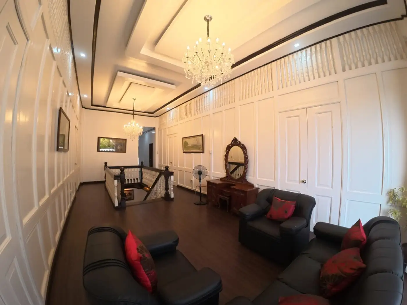 Upstairs sala with crystal chandelier