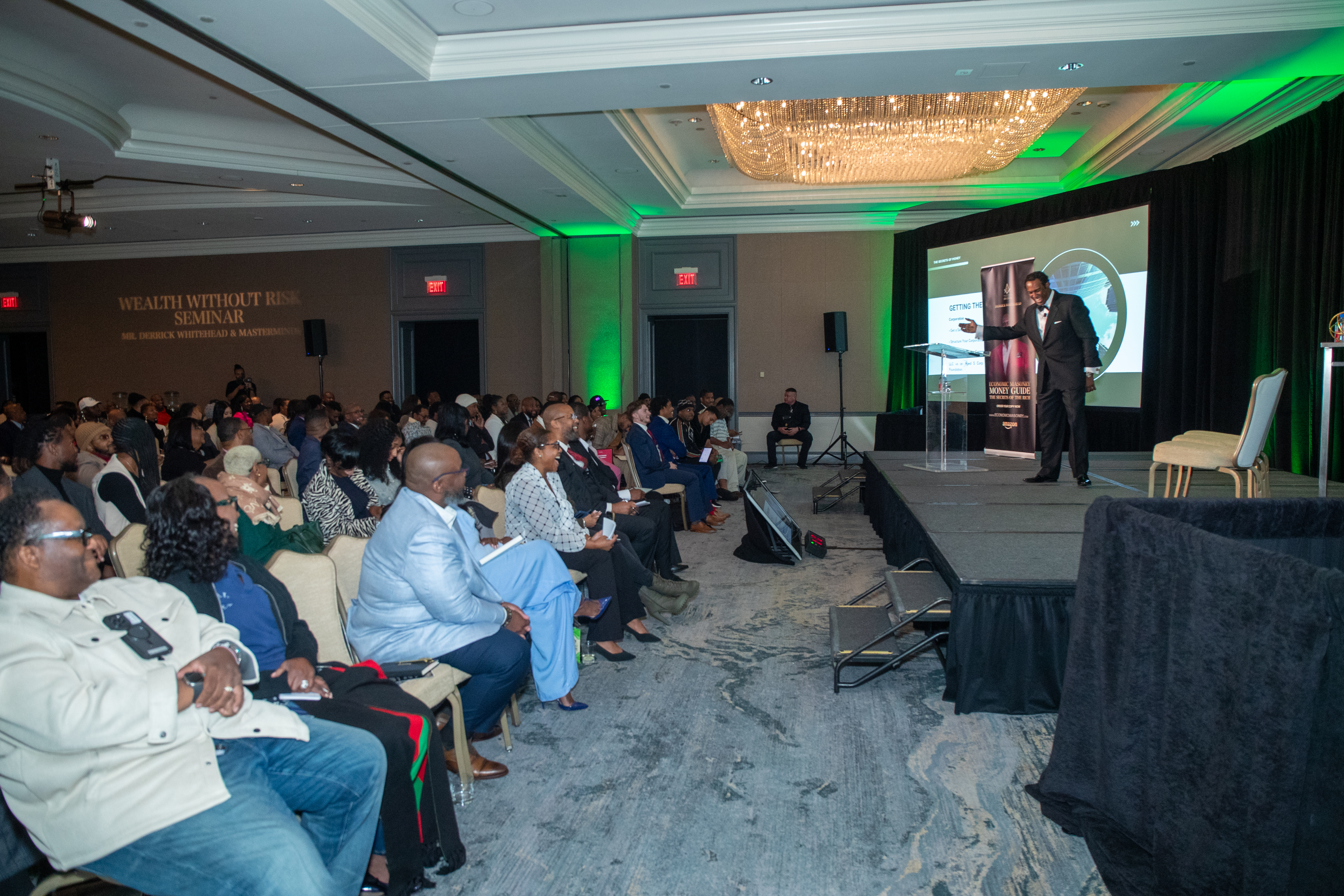 Derrick Whitehead presenting to business owners at a live event