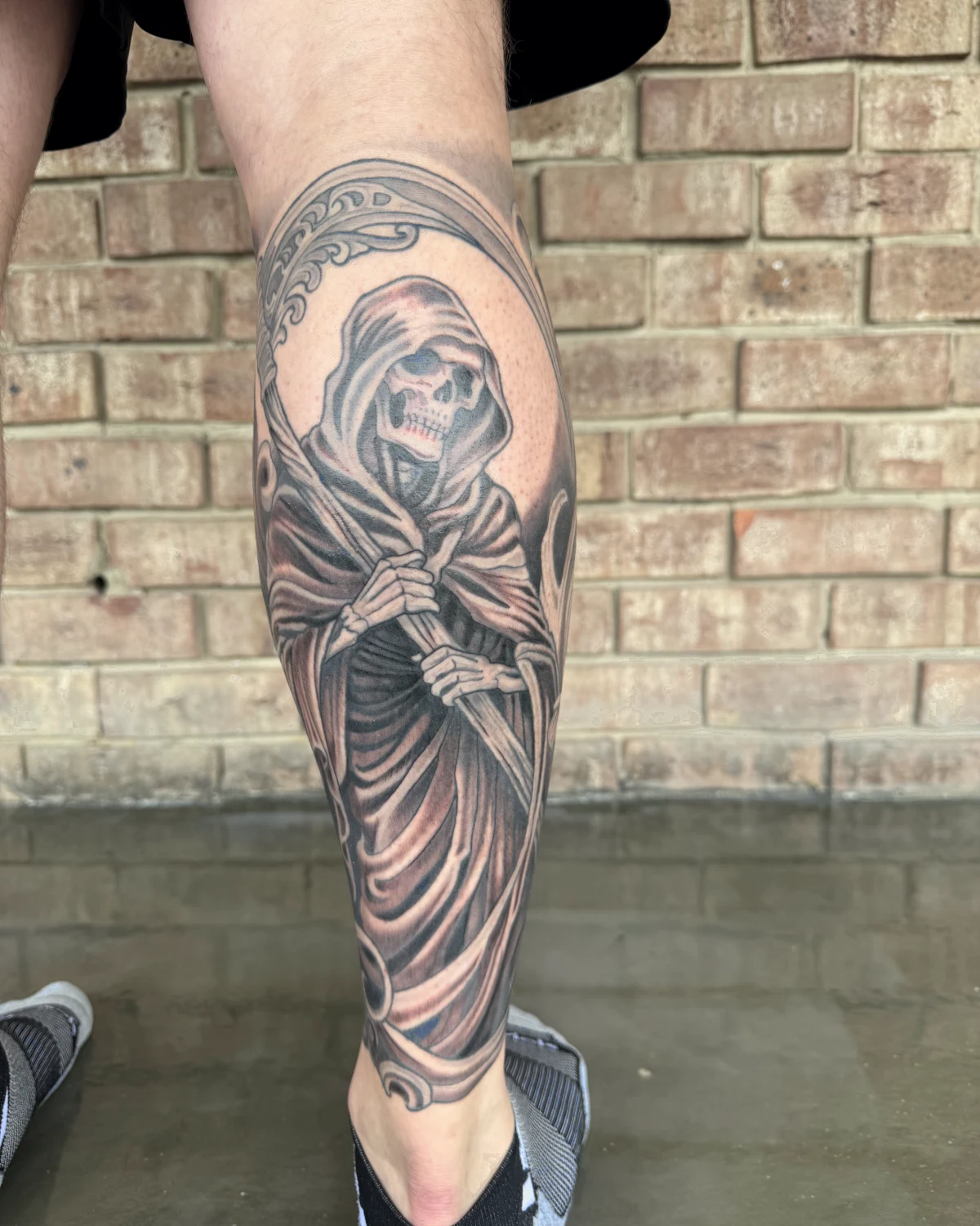 Black and grey Grim Reaper tattoo by Nicole Miller in Missoula Montana