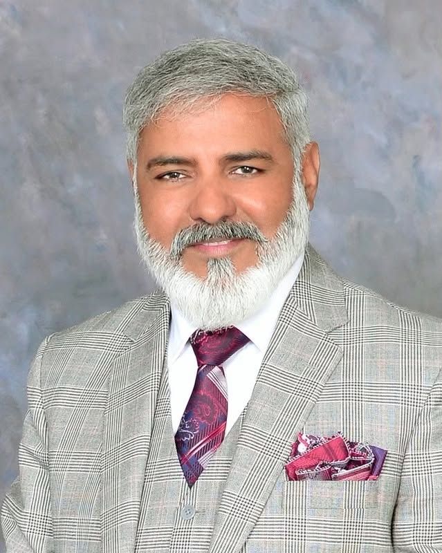 Tassawar Syed in front of Mississauga City Hall