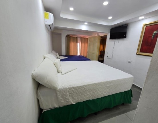 Suite Presidencial con sala, comedor y 2 camas Queen