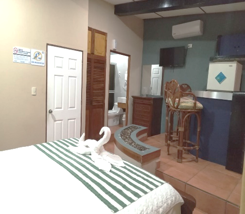 Suite Matrimonial con cama King y mini bar