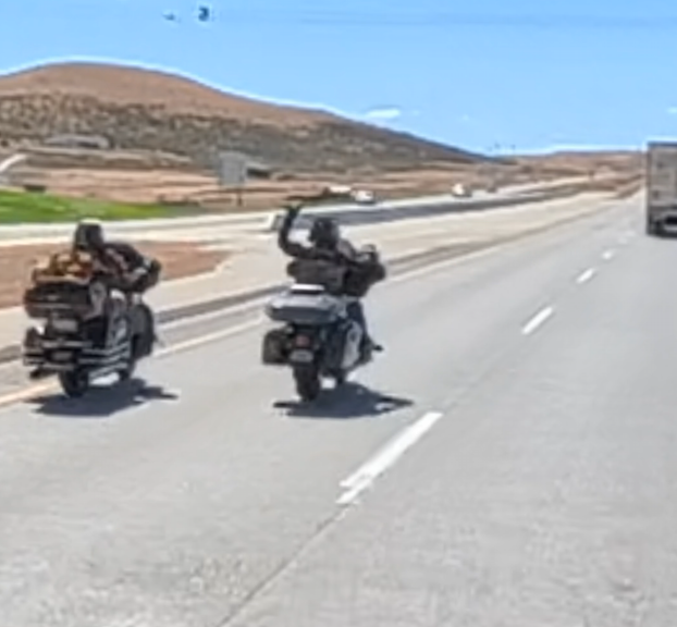 Bikers throwing the shaka on the Idaho highway, Washington road trip