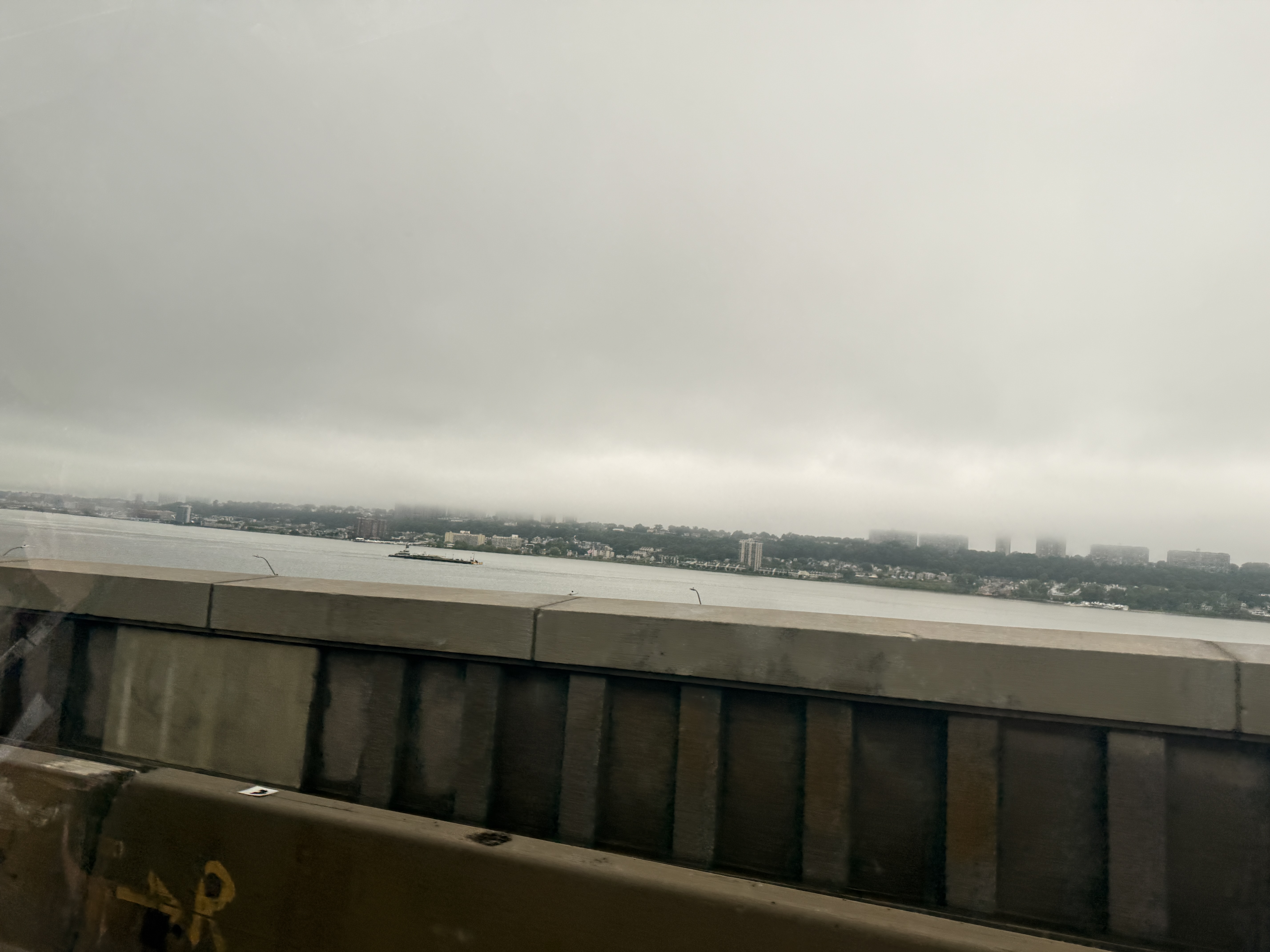 Rainy view from the car while traveling from Nanuet toward Manhattan.