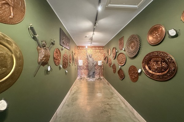 Copper artwork displayed along a gallery at the Arizona Copper Art Museum. Copper artwork displayed along a gallery at the Arizona Copper Art Museum.