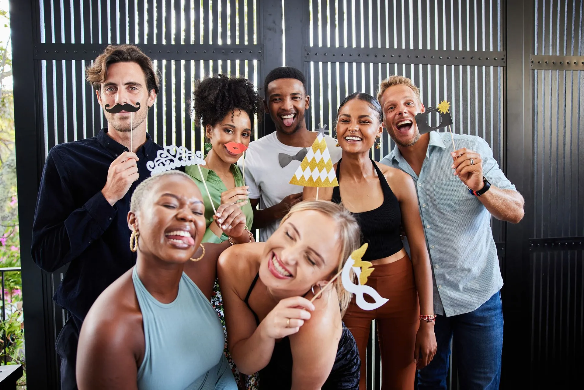 photobooth photo of people smiling 
