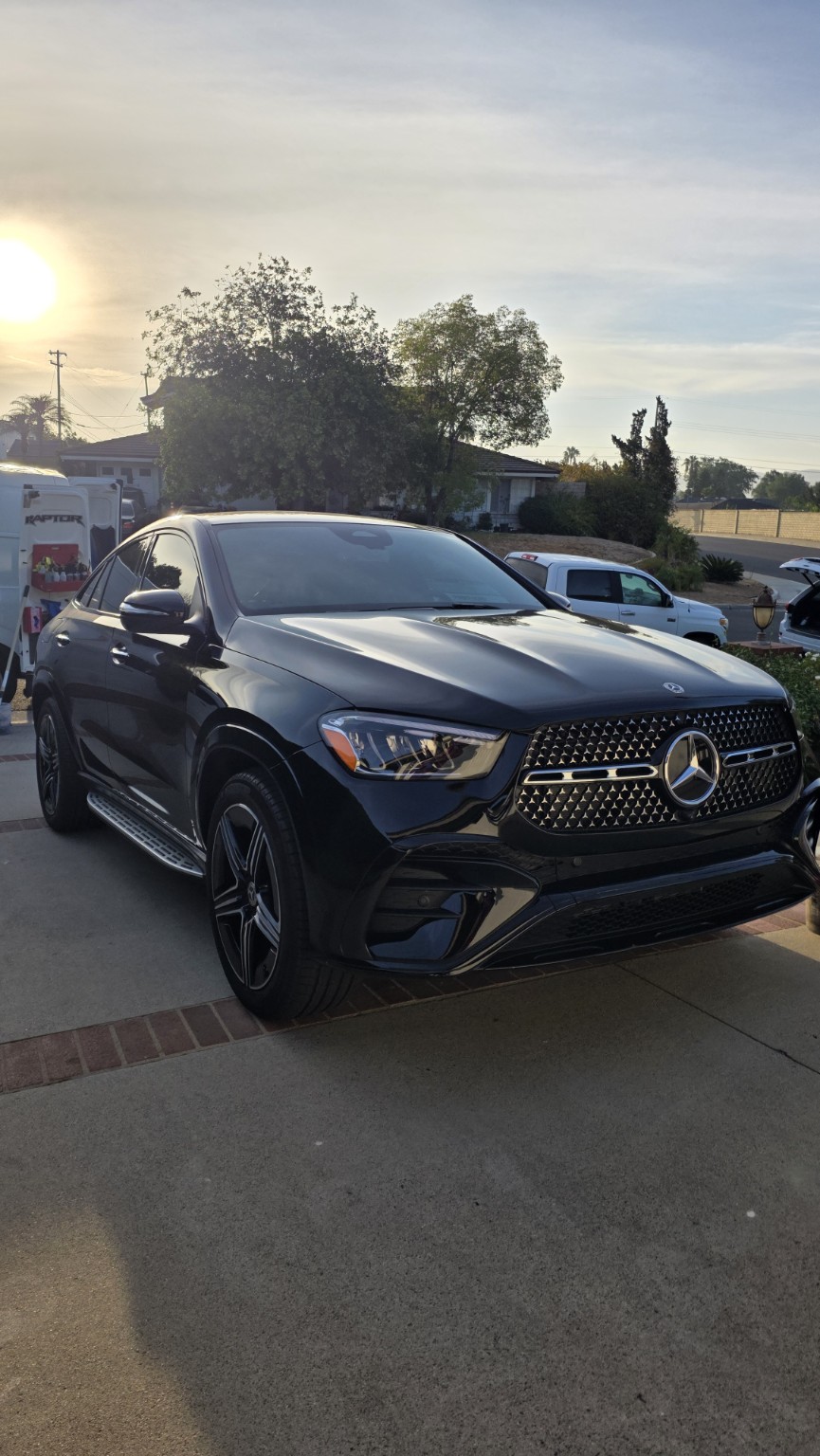 Black 2024 Mercedes-Benz GLE Coupe maintenance detail result photographed in warm evening light