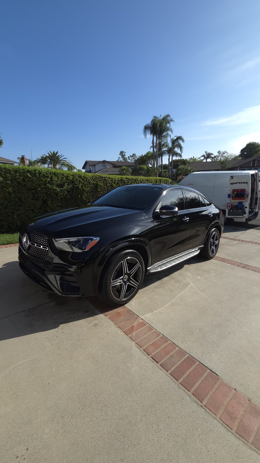 Full exterior view of a black 2024 Mercedes-Benz GLE Coupe after maintenance detailing