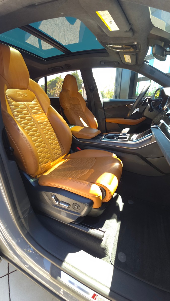 Clean tan leather seats in an Audi RS Q8 after an interior detail