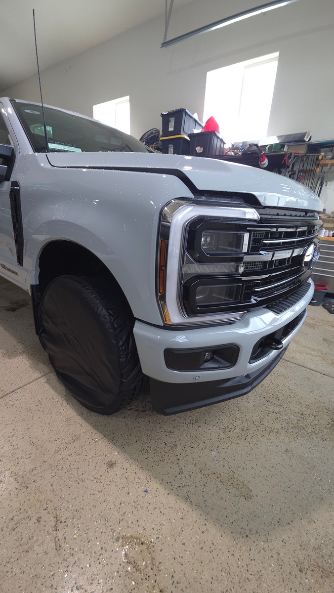 Ford F-350 in a garage before front paint protection film installation