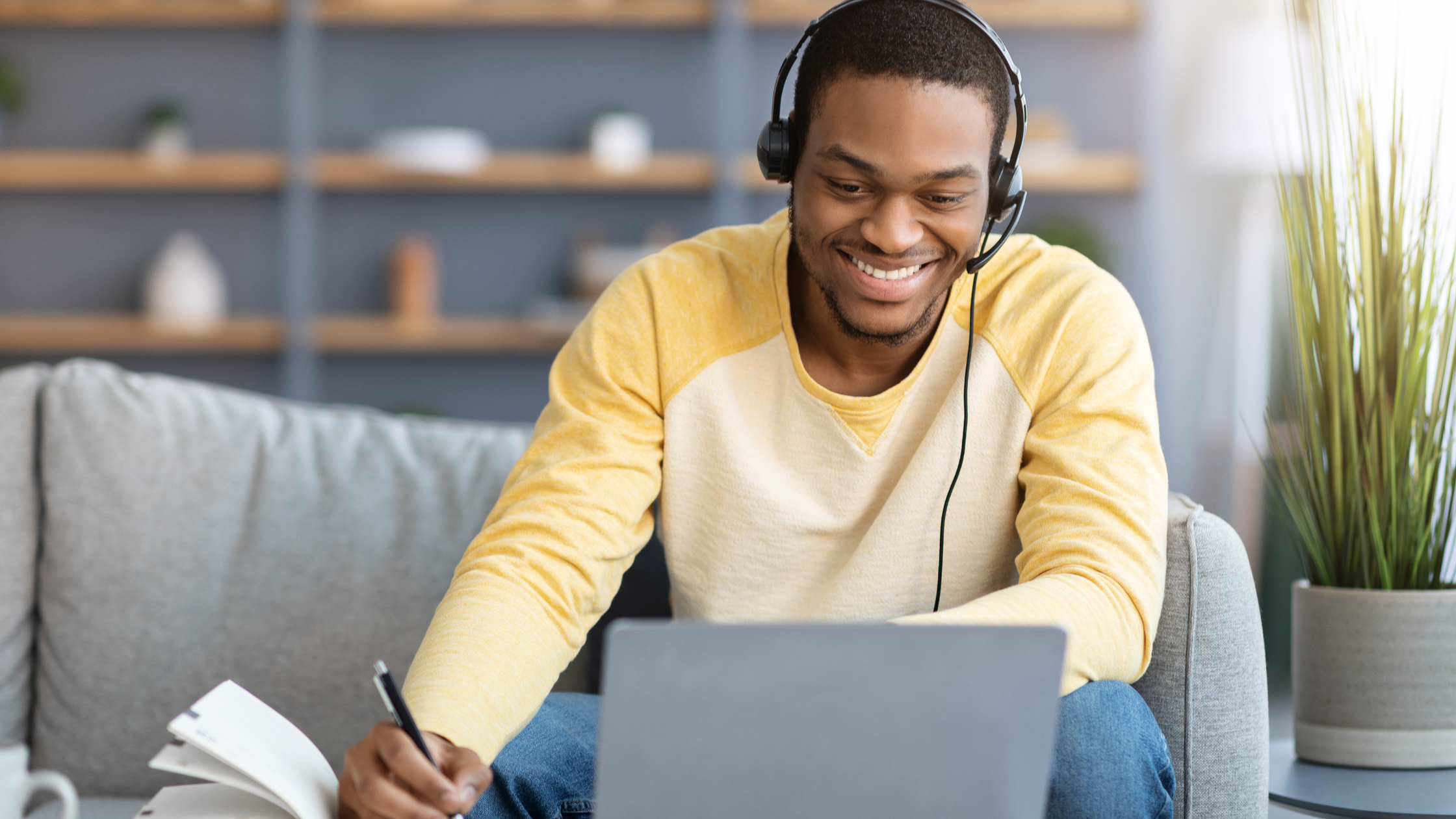 Beginner learning Spanish basics with short video lesson on laptop