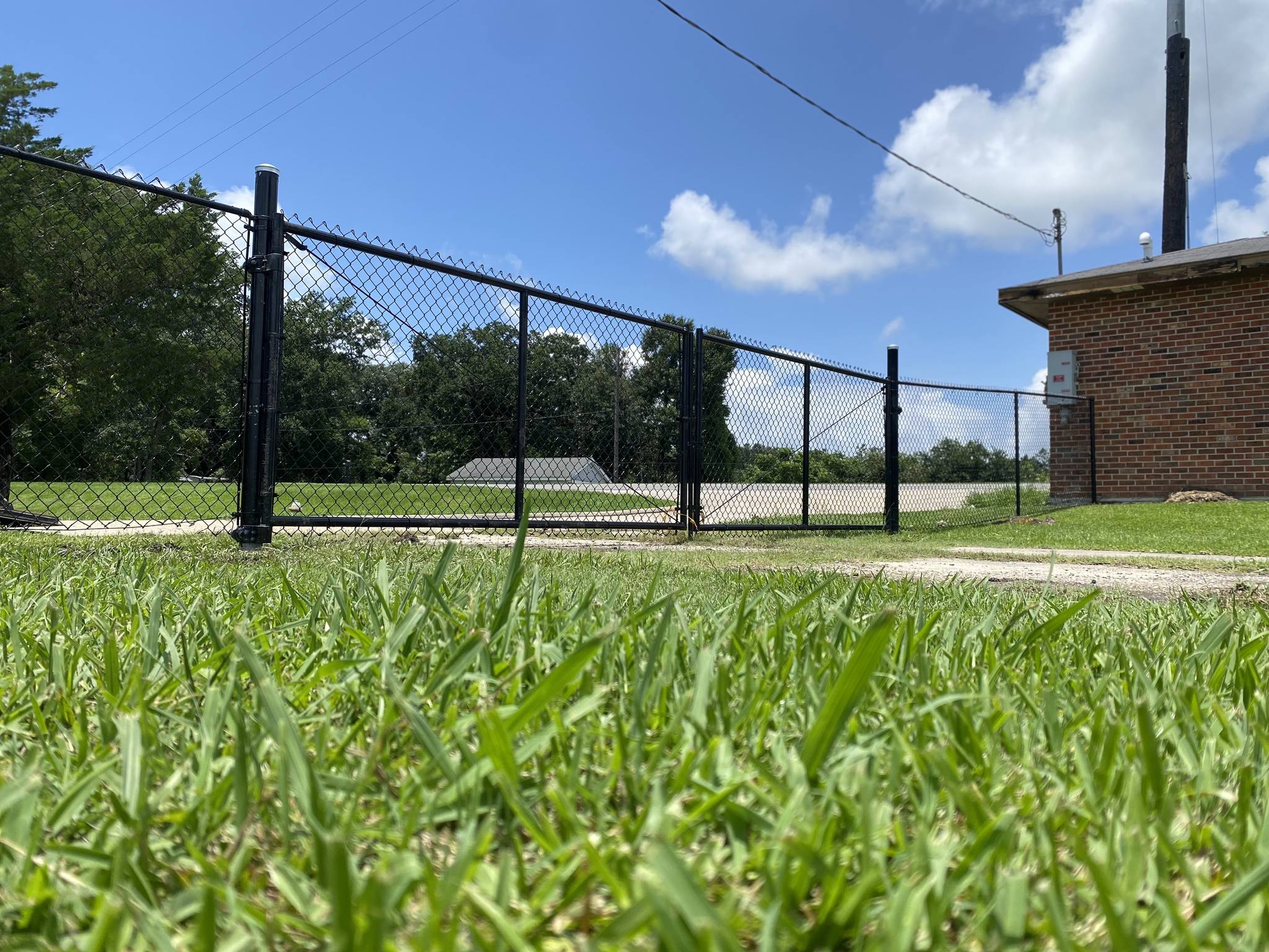 Black vinyl-coated chain-link fence