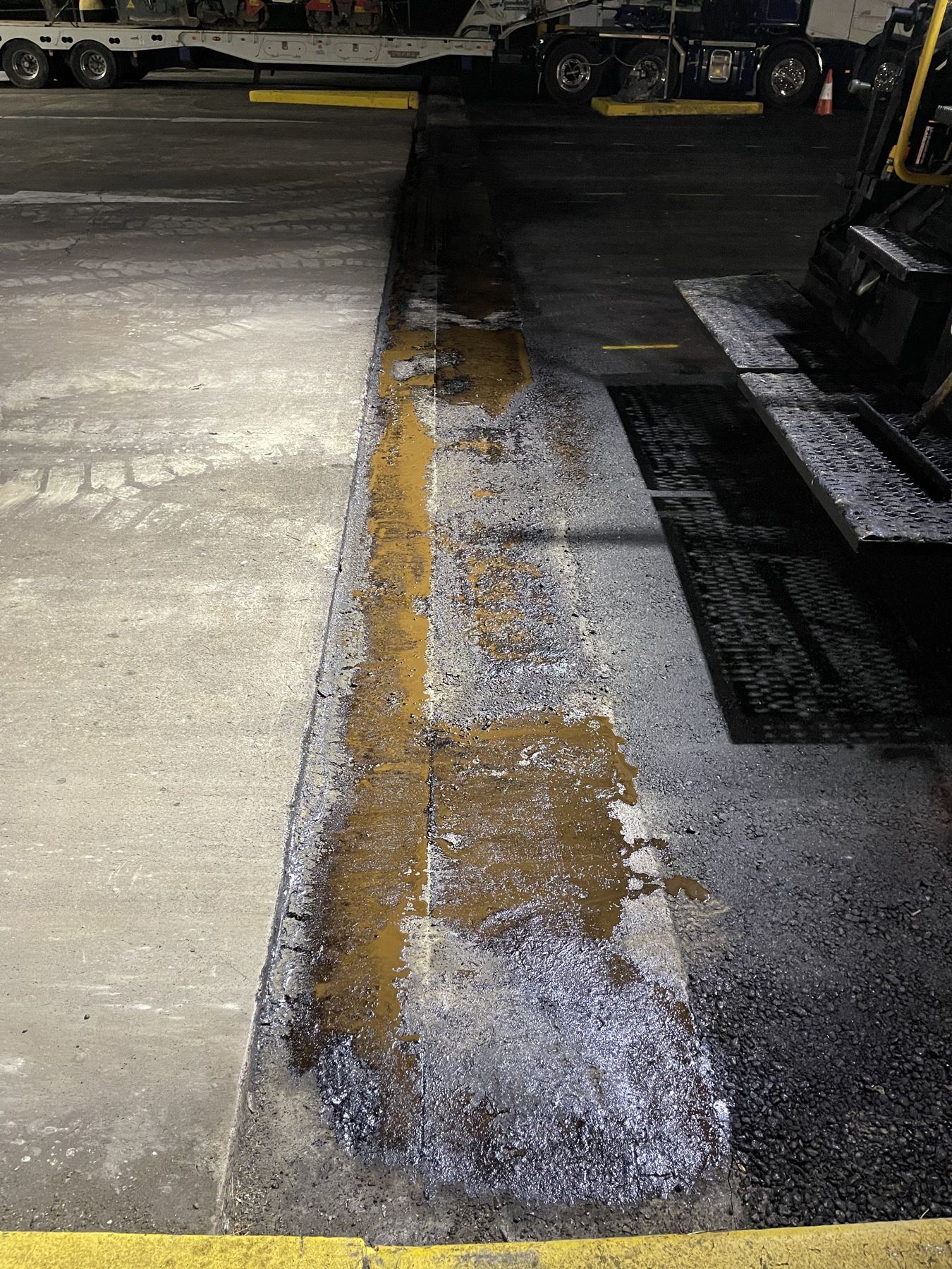 Damaged asphalt cut out ready for a hot mix repair