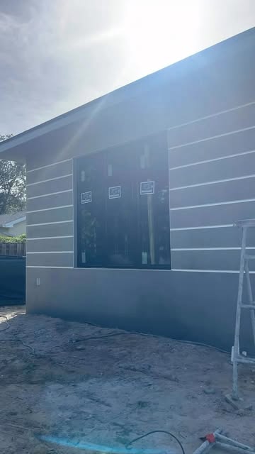 Exterior wall with horizontal stucco banding
