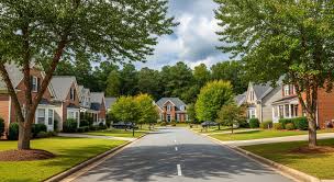 Residential neighborhood in Durham North Carolina with tree-lined street and homes for sale Residential neighborhood in Durham North Carolina with tree-lined street and homes for sale