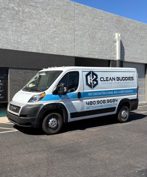 Clean Buddies branded service van parked outside the company shop in Phoenix