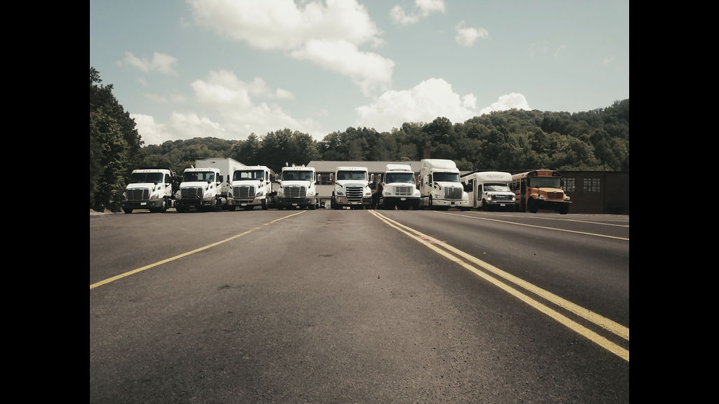The CDL Assist training fleet lined up at the Beckley, WV facility