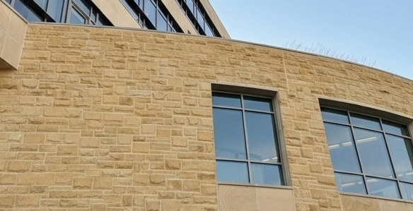 After facade cleaning by WindowClean by Vertex showing cleaned and restored commercial building exterior texture
