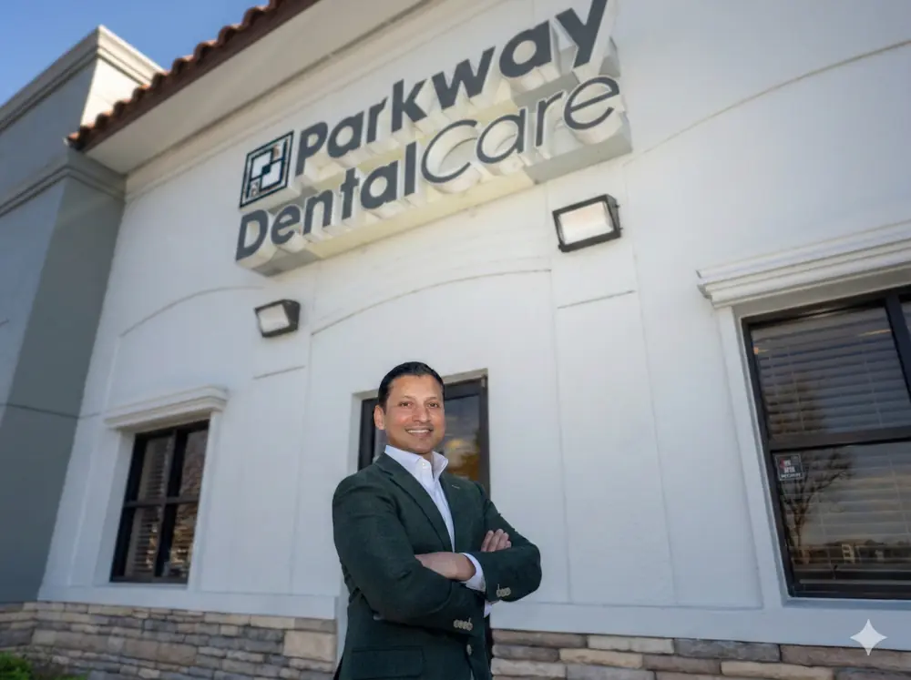 Dr. Philip T. Philip outside Parkway Dental Care in Kissimmee