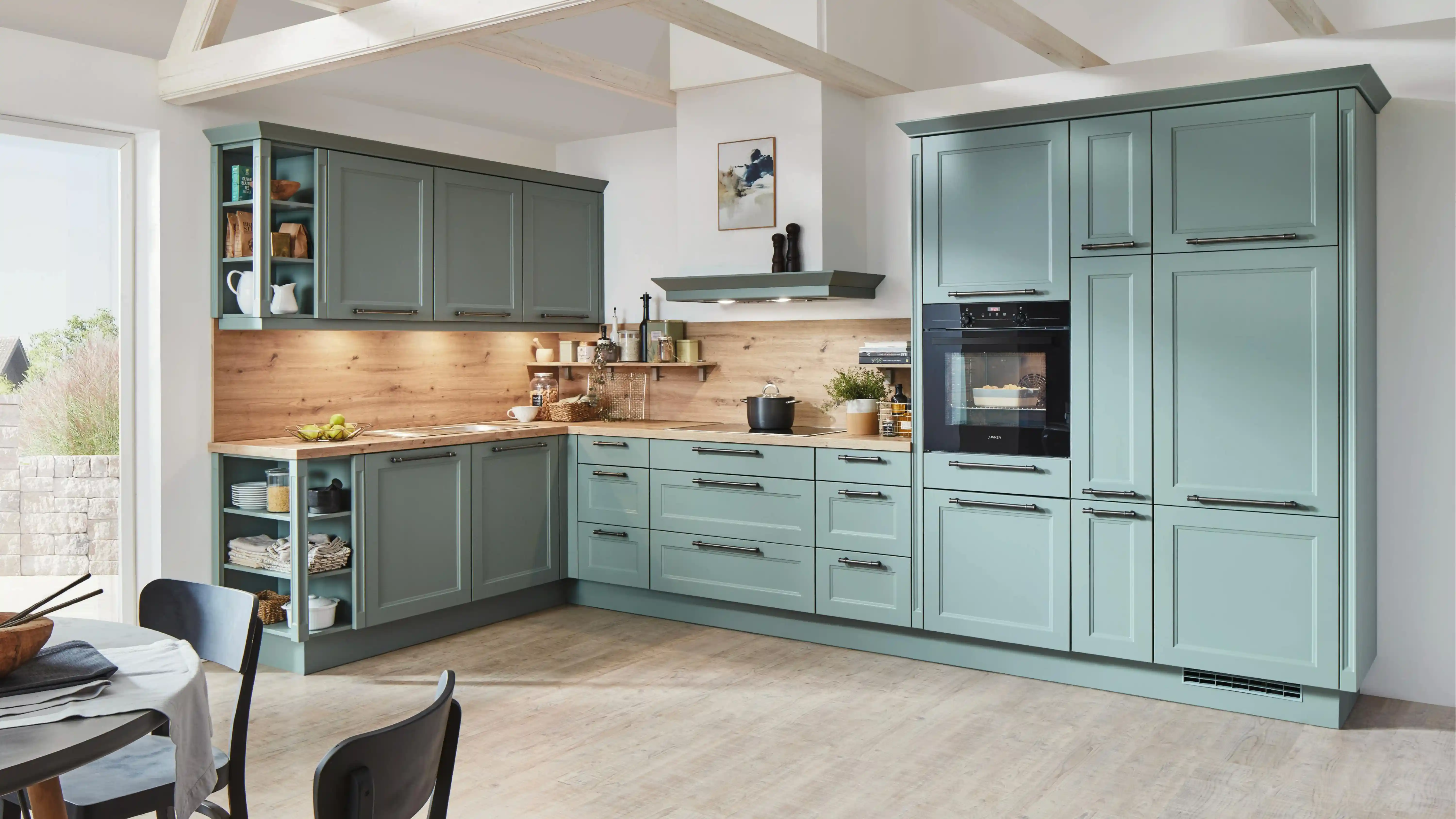 A green shaker style kitchen in London, UK