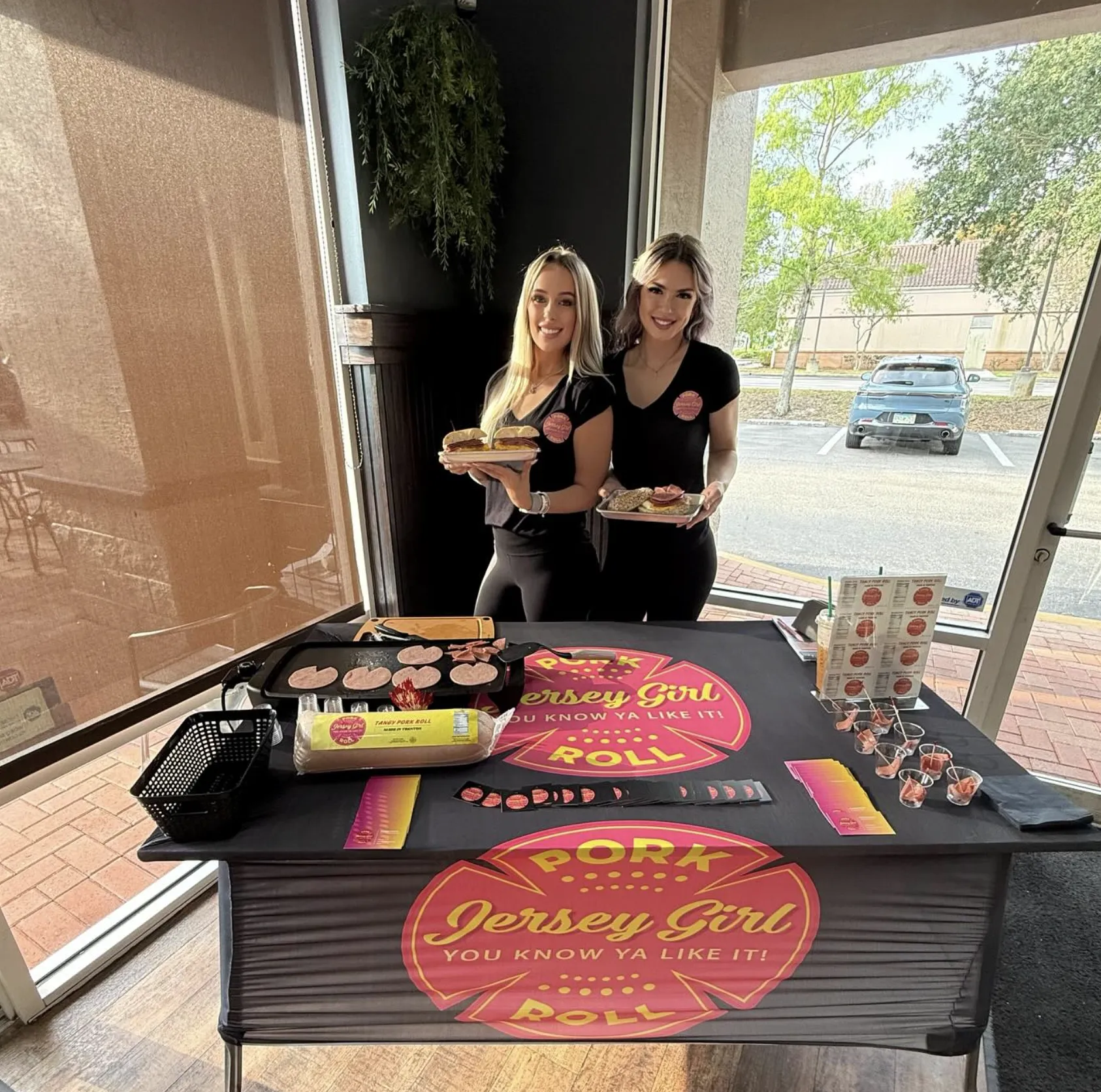 The Jersey Girl crew with pork roll sandwiches