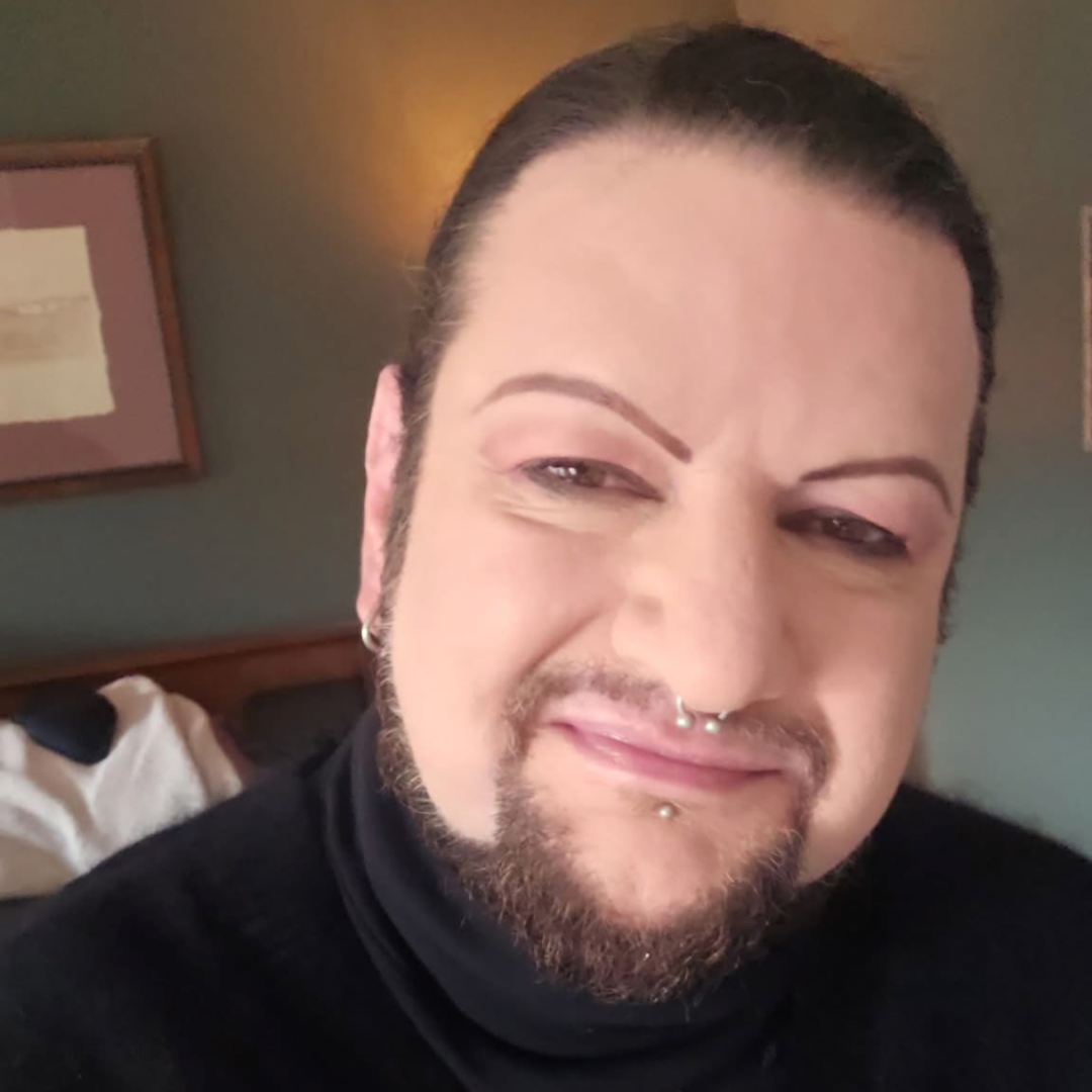 Stylist Kevin cutting hair in the salon