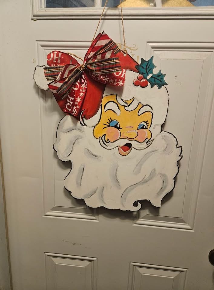 ArtGirls member, Kathy P. painted Santa door hanger