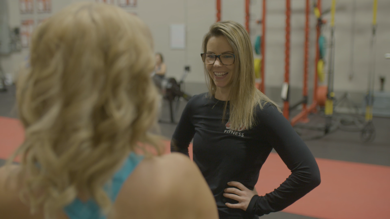 Woman exercising with personalized coaching at 360 Fitness Sherwood Park