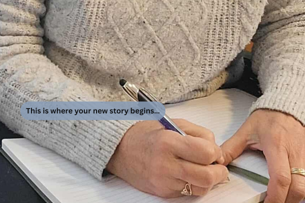Woman’s hands writing in journal with cozy sweater — symbolizing fresh start and calm wellness resources for gut, brain, and skin support.