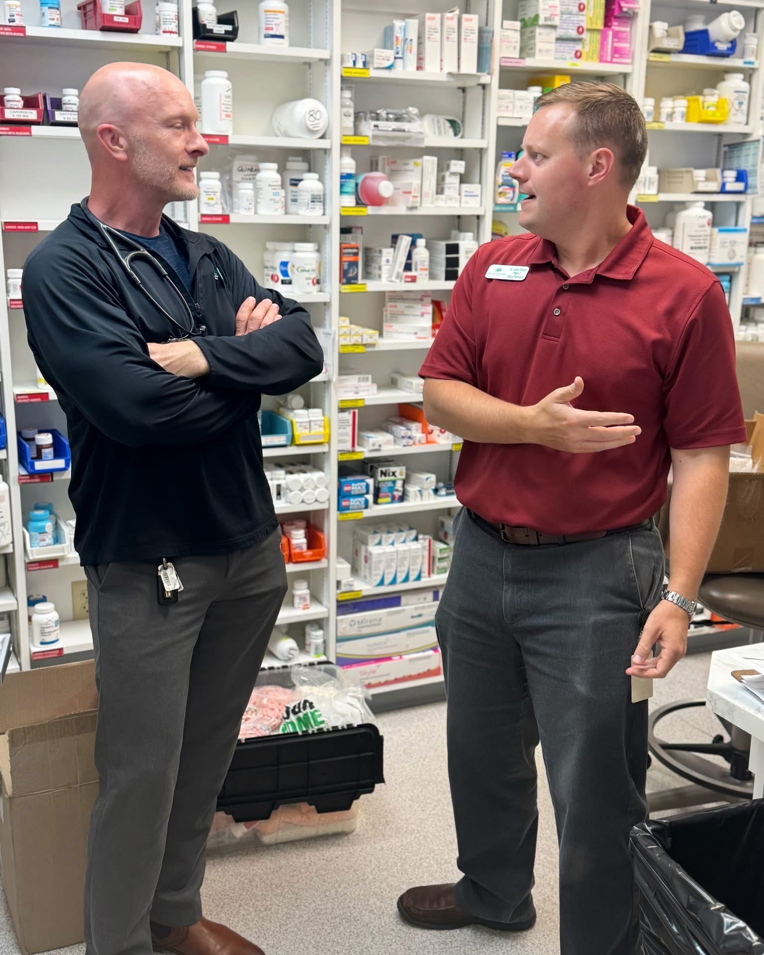 Dr. Pearson in clinic with a patient