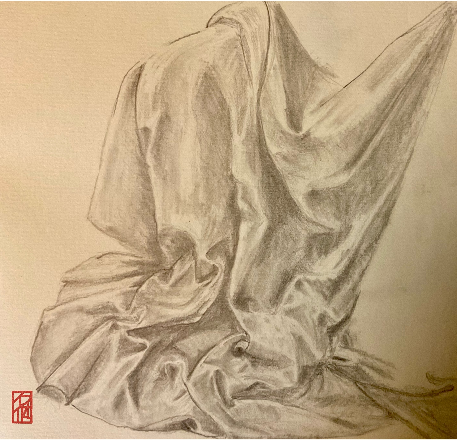 Example, the hanko image is placed at the lower-left corner of the drawing.