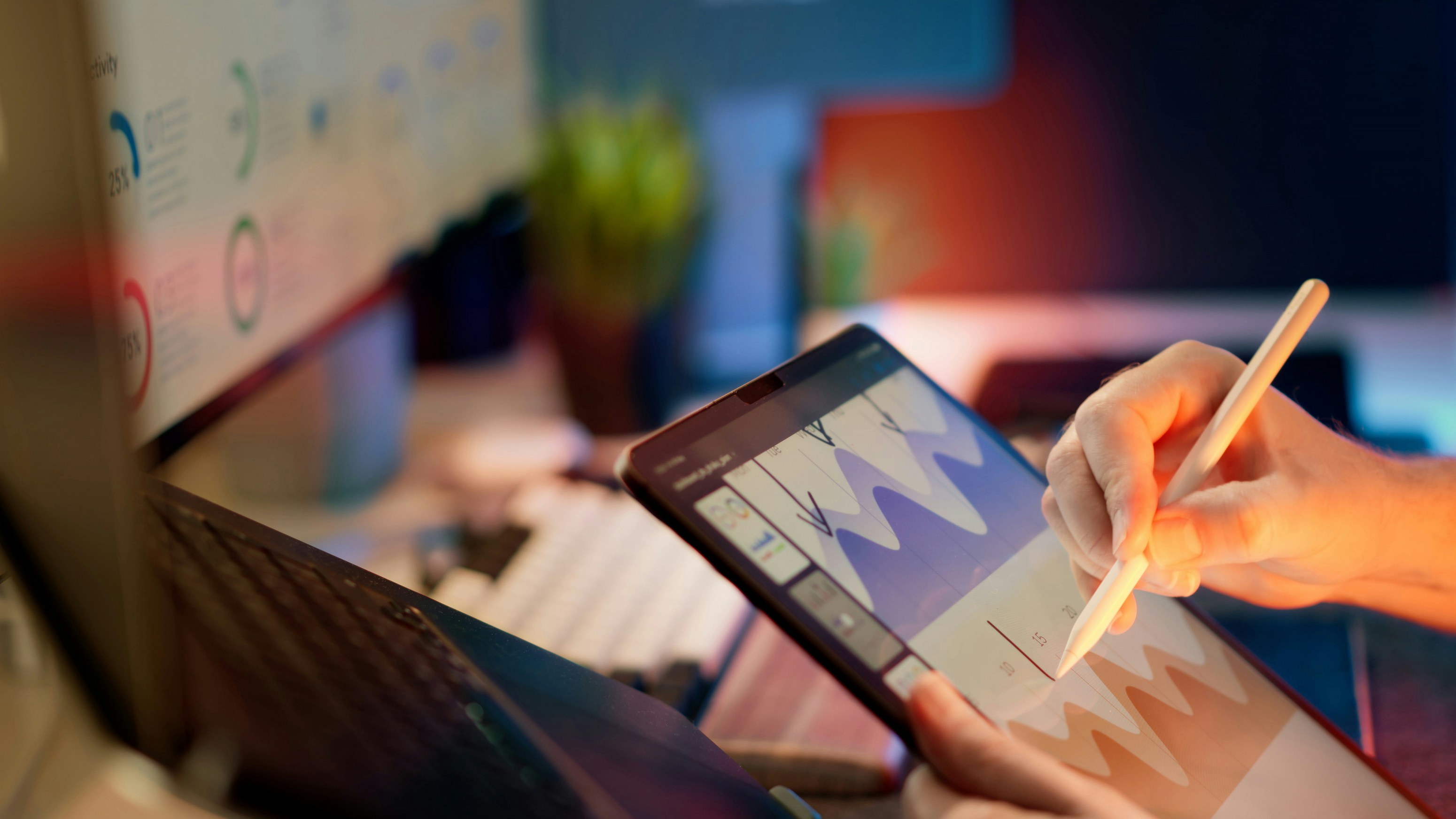 Marketer analyzing pay per call campaign KPIs on a tablet dashboard