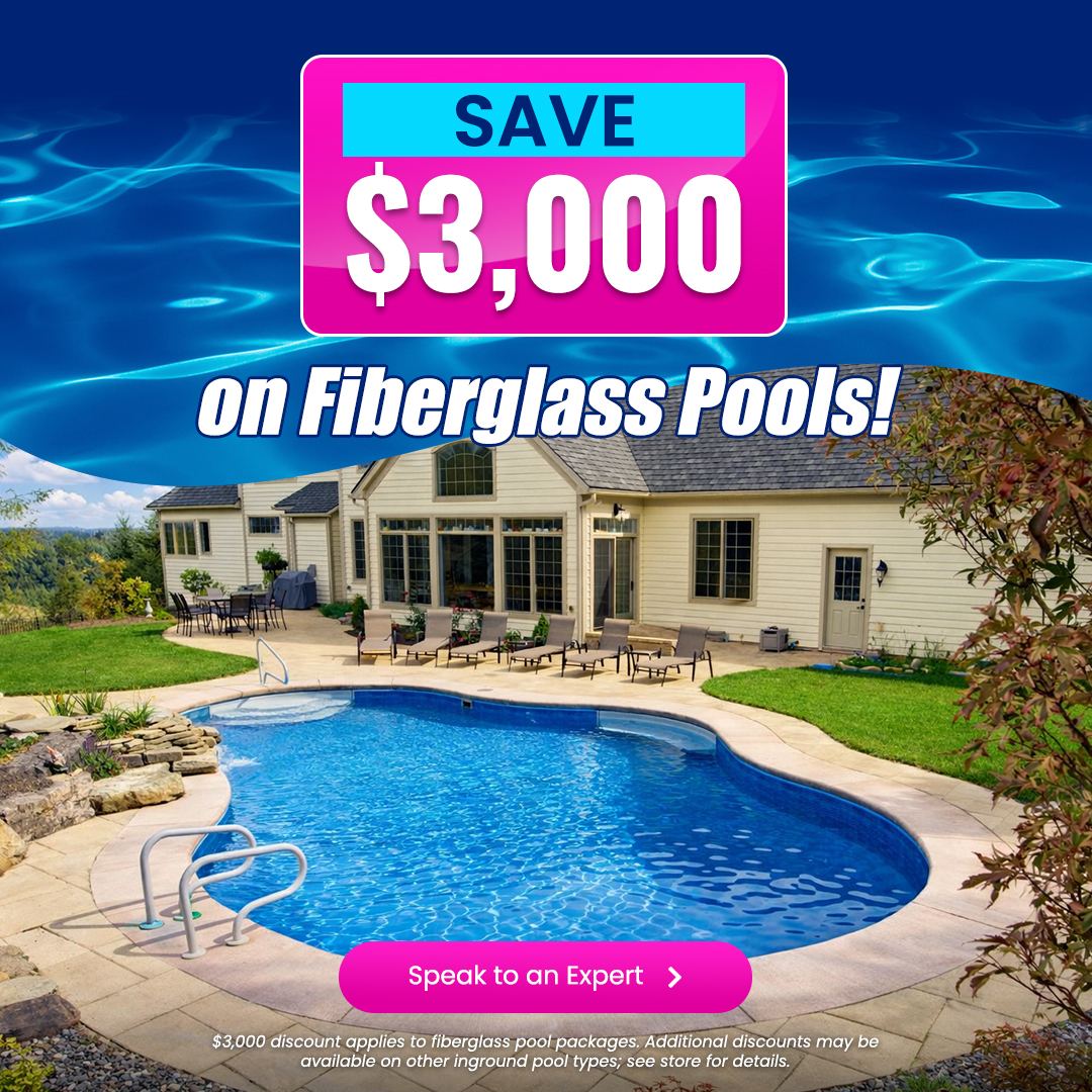 Luxury custom backyard pool at dusk with modern home, starting at $69,995 with a free $2,500 upgrade offe