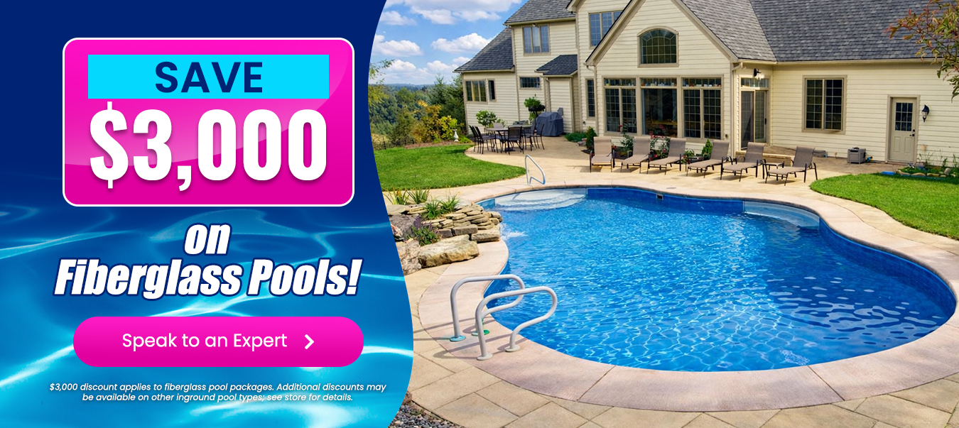 Luxury custom backyard pool at dusk with modern home, starting at $69,995 with a free $2,500 upgrade offe