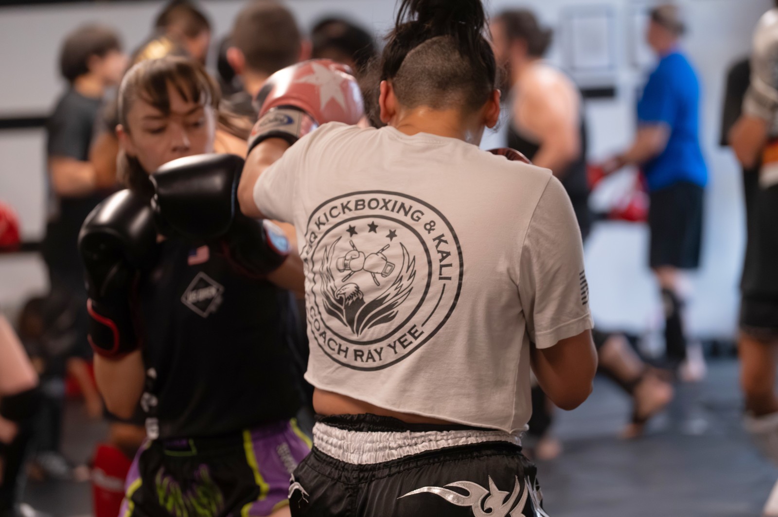 Martial arts instructor with kids