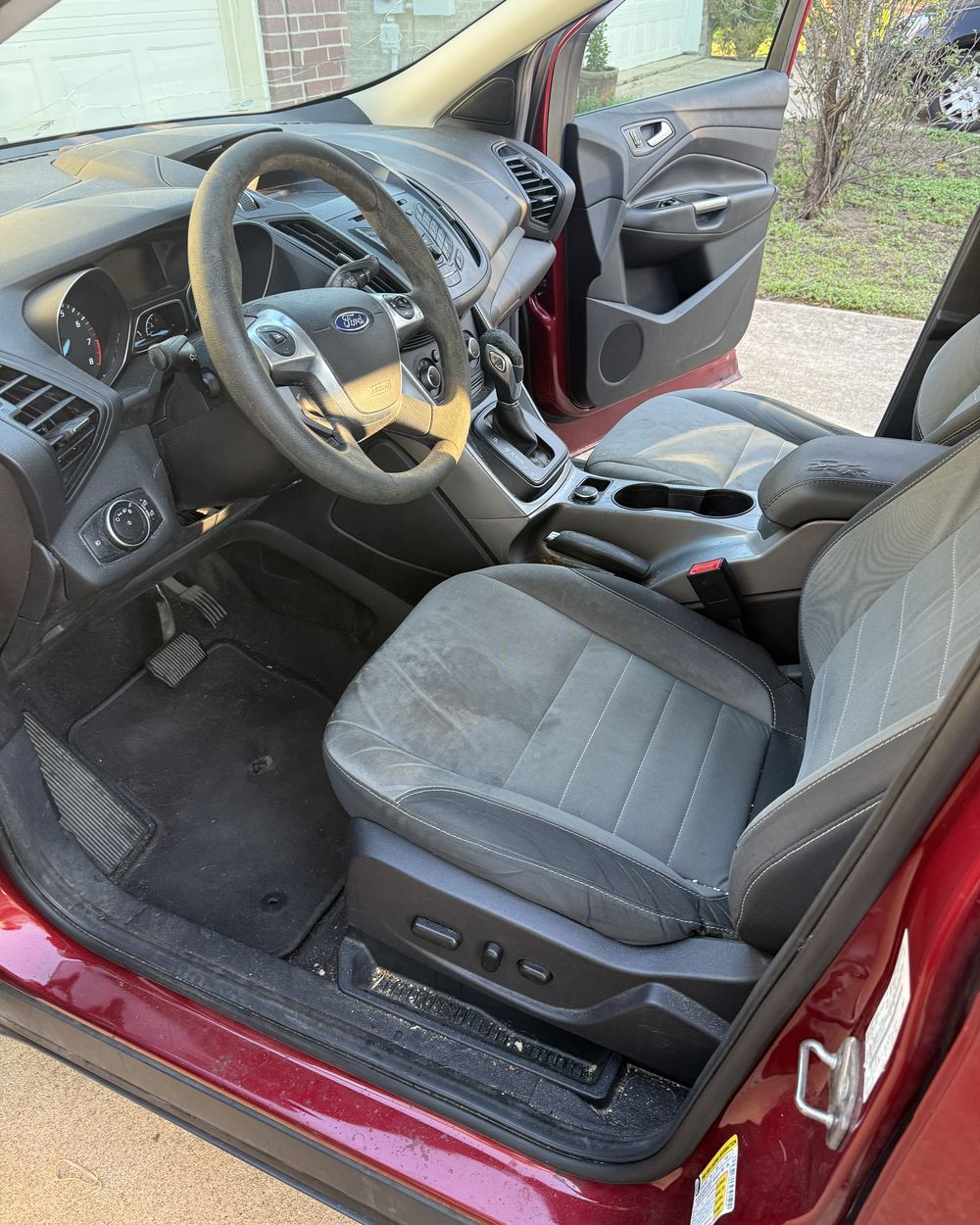 Before: dirty driver-side interior