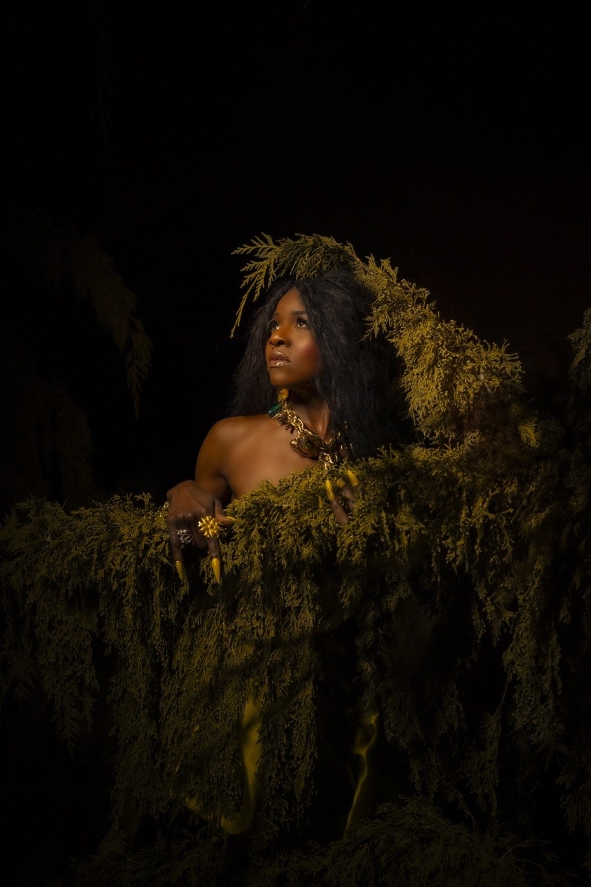 The Goddess emerging from the sacred grove