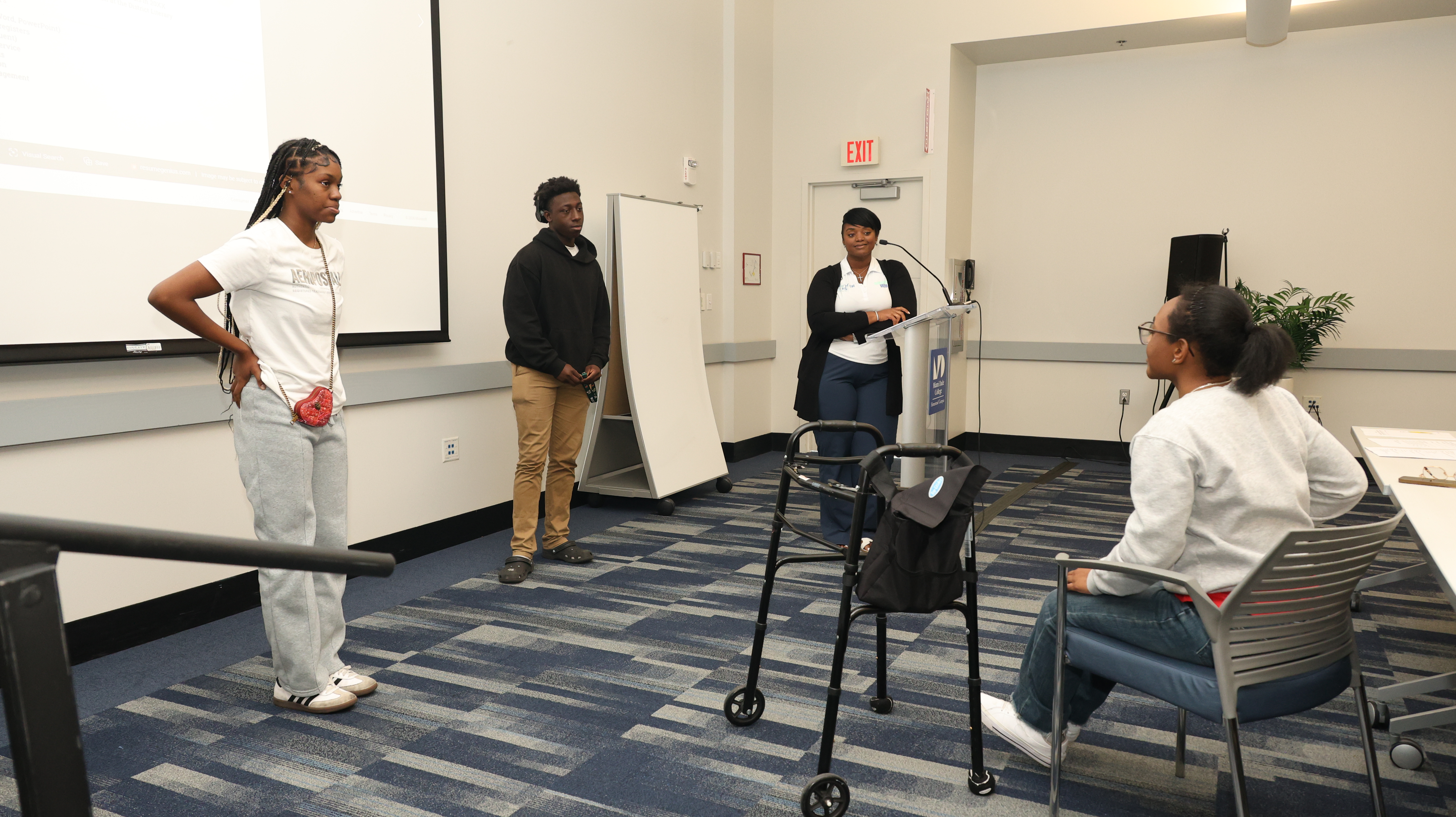 Students practicing self-advocacy and workplace communication skills during a class presentation at Better Steps Life Skills Center.