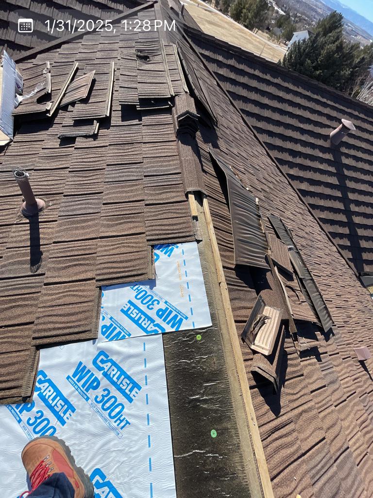 Castle Rock Colorado residential roof replacement crew working