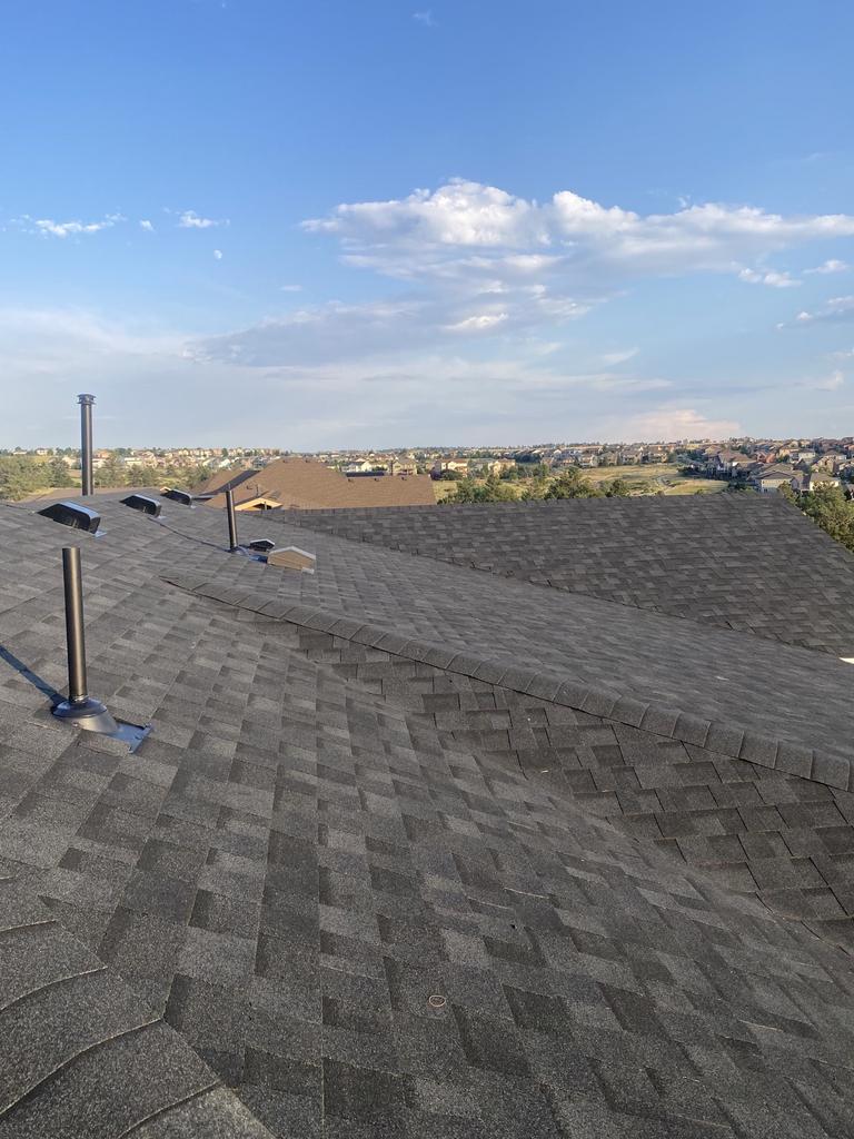 Roof Ready crew repairing a residential roof in Parker, CO