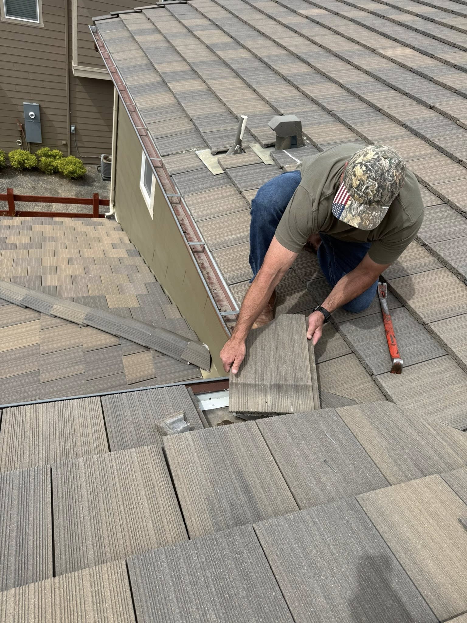 Local roofer inspecting a home's roof in Parker, CO