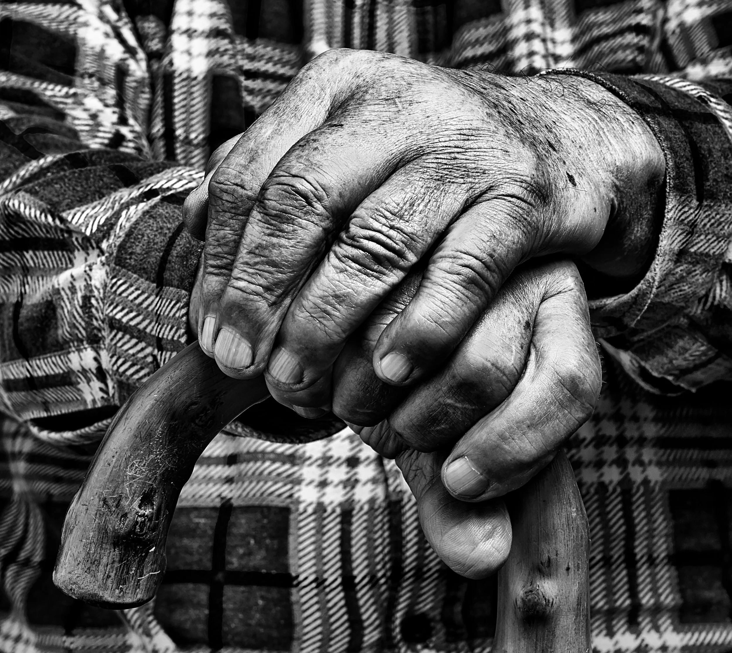 Caregiver holding patient's hand