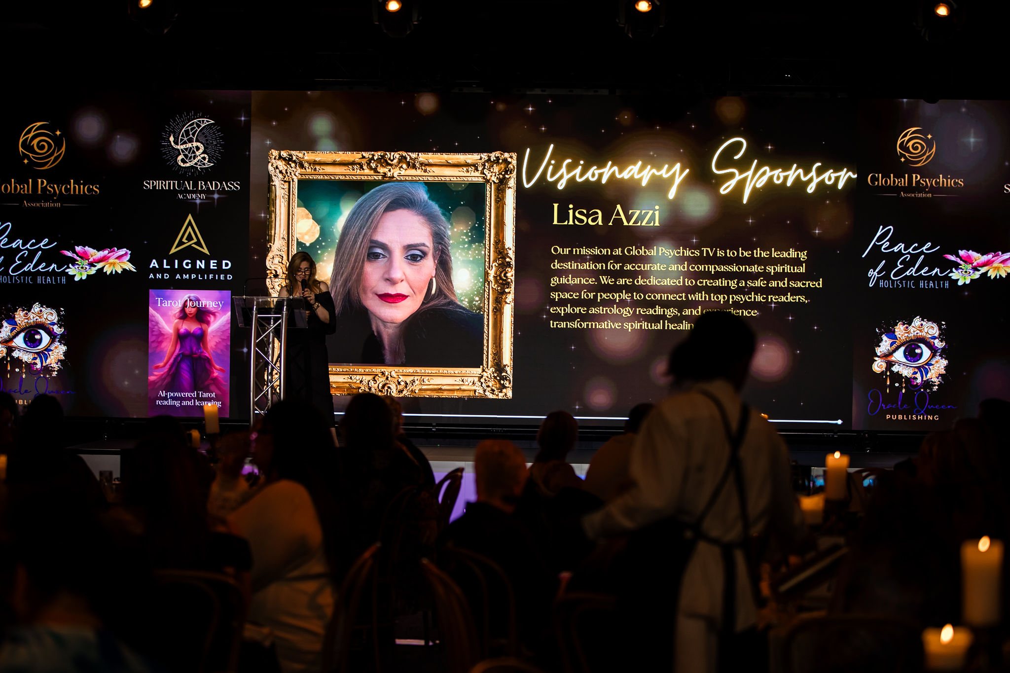 Lisa Azzi, Visionary Sponsor, presenting on stage at SLAI 2025