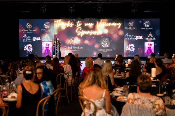 Kelly Wotherspoon speaking at a leadership conference to a full room