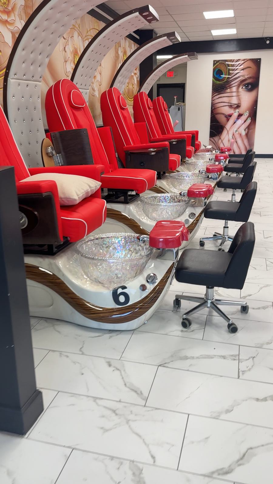 Pedicure stations with crystal soaking bowls and marble floors at Allure Nail Bar Norcross