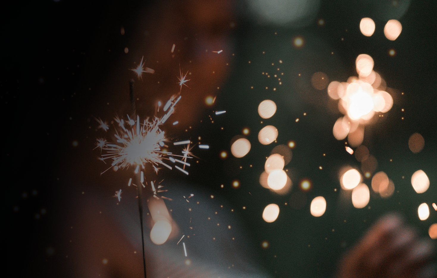 Sparkler celebration symbolizing weddings, proms, and special event transportation with LH3"