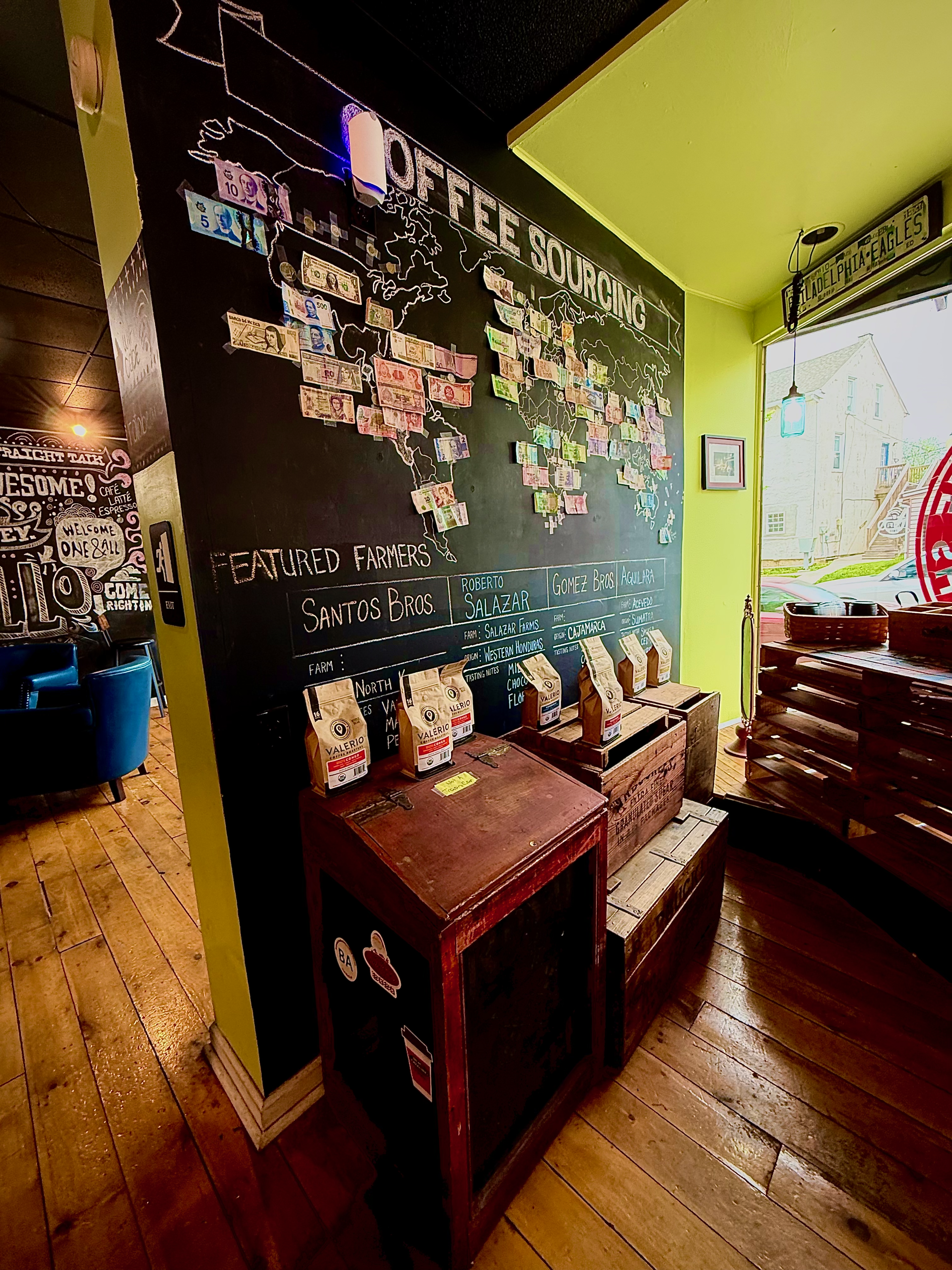 Coffee sourcing wall and Valerio Roasters beans at Brewed Awakening Royersford PA