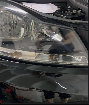 Cloudy headlight lens before professional headlight restoration