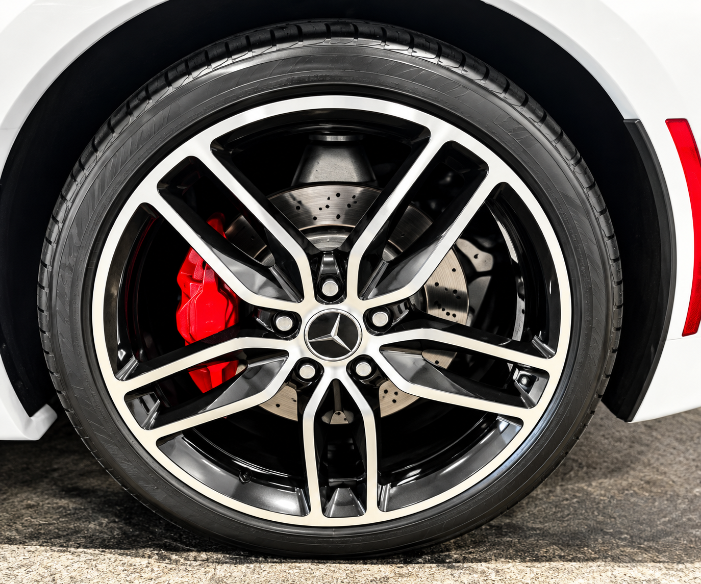 Detailed alloy wheel and clean dressed performance tire